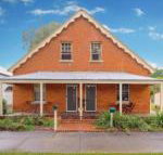 Eliza 1875 Red Brick Duplex Townhouse